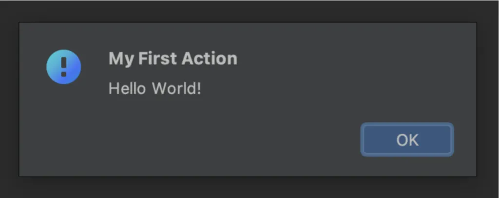 Screenshot of a "My First Action" dialog showing the "Hello World!" message produced by the custom action.