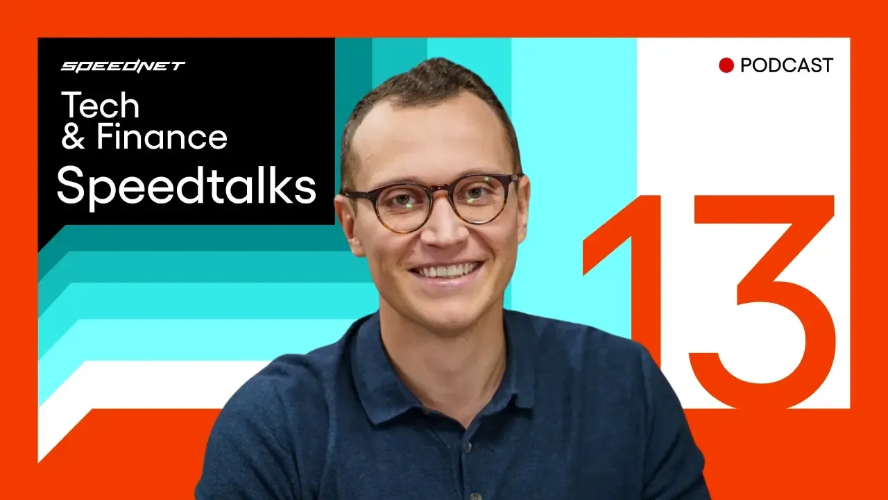 Speedtalks podcast cover for episode 13, with a smiling host in glasses beside the Speednet logo.