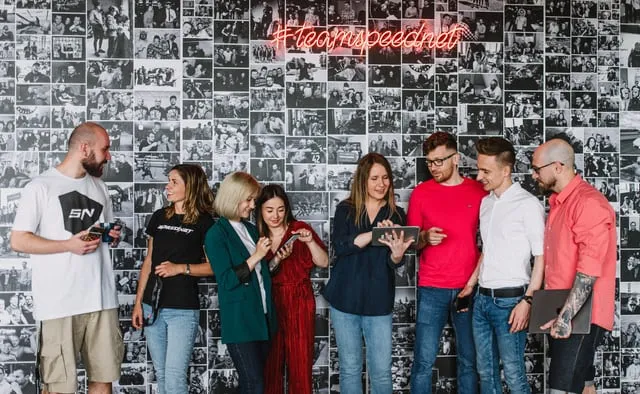 Speednet team members standing in front of the